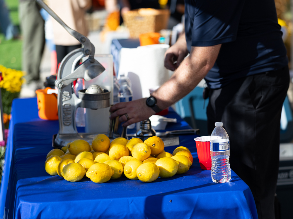 Man making lemonade at the Downtown Urbandale Block Party