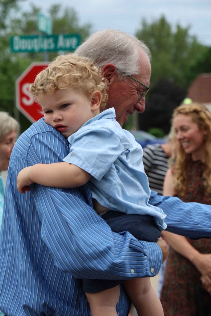 mural-ribbon-cutting-grandparent-holding-toddler