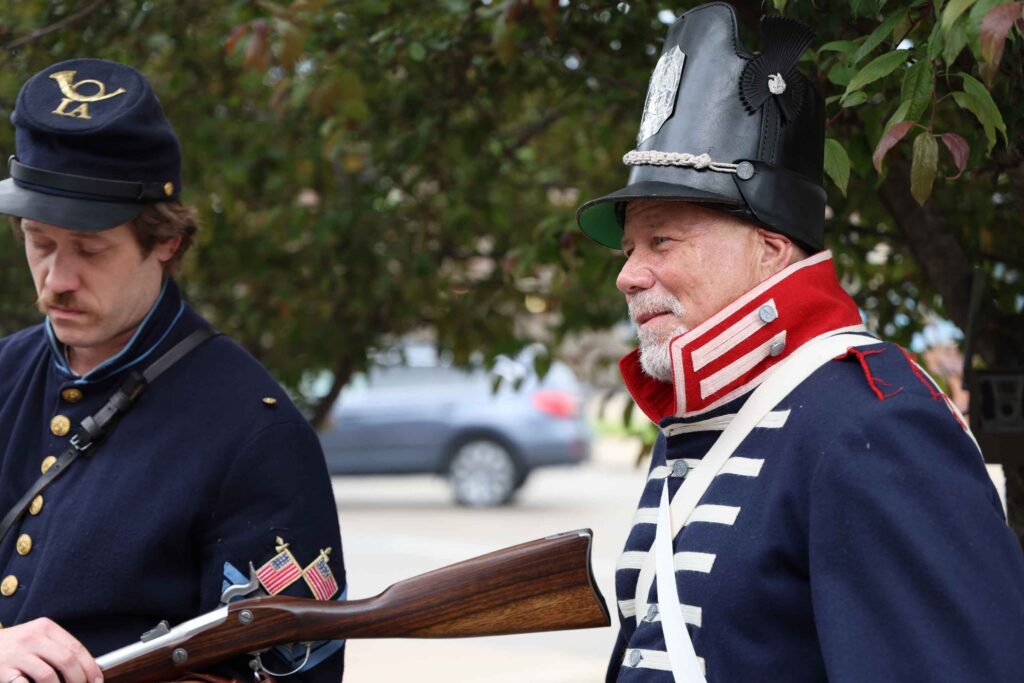 mural-ribbon-cutting-reenactors-with-musket